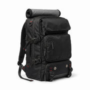 Black travel backpack with a rolled-up mat on a white background