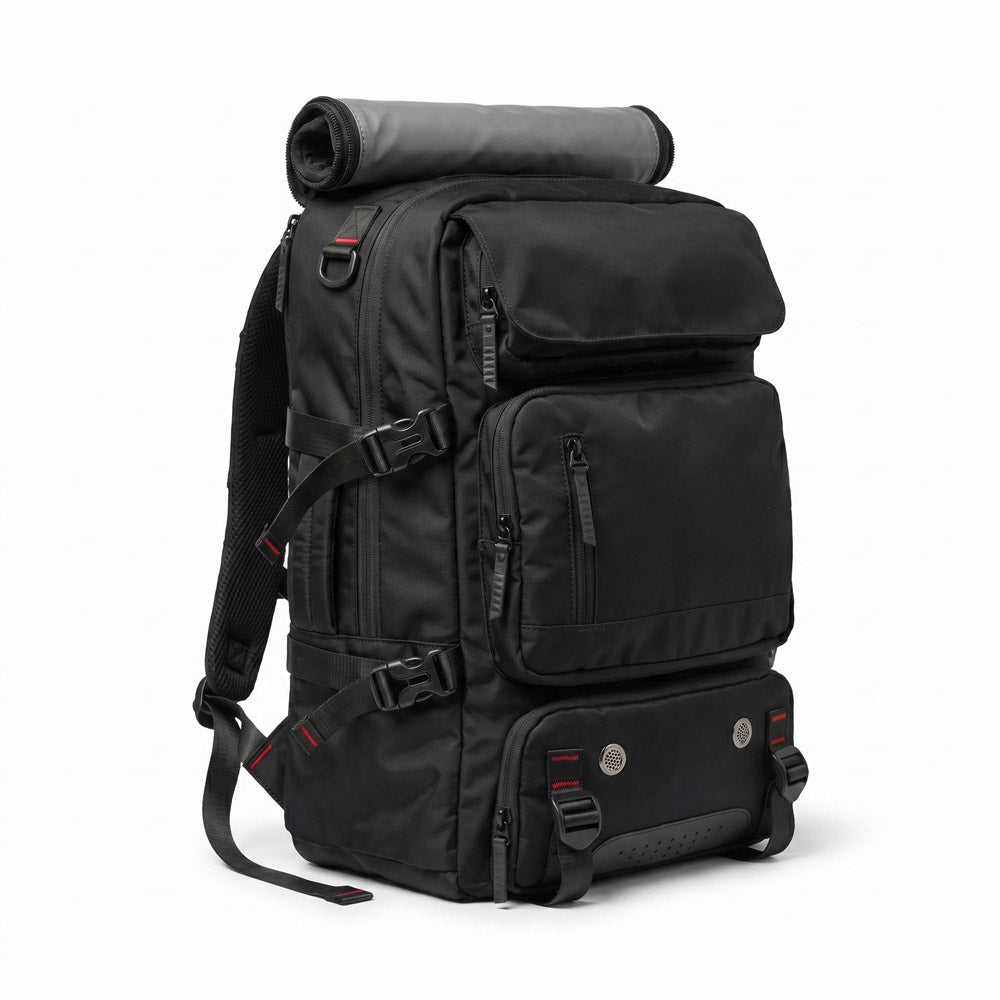 Black travel backpack with a rolled-up mat on a white background