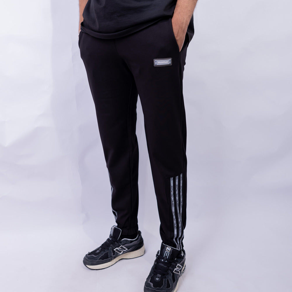 Slim Fit Jogger Sweatpants with Side Stripes and Logo Patch in Black — Front View | Giovane Clothing